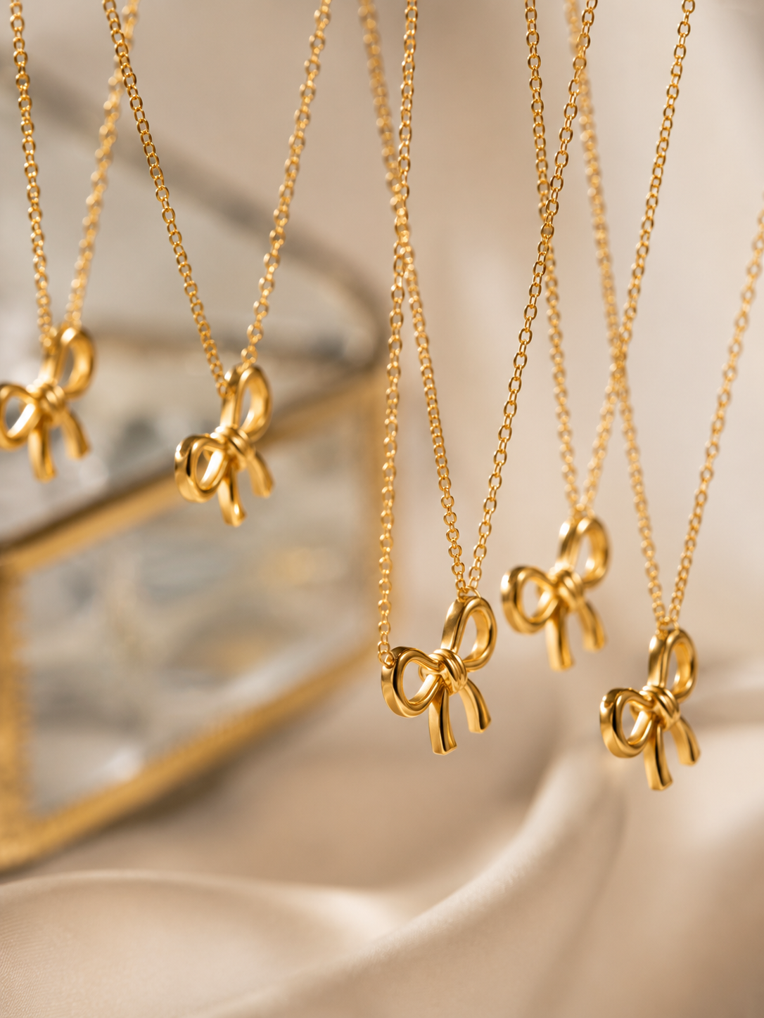 Elegant Gold Bow Pendant on Chain - Image 4