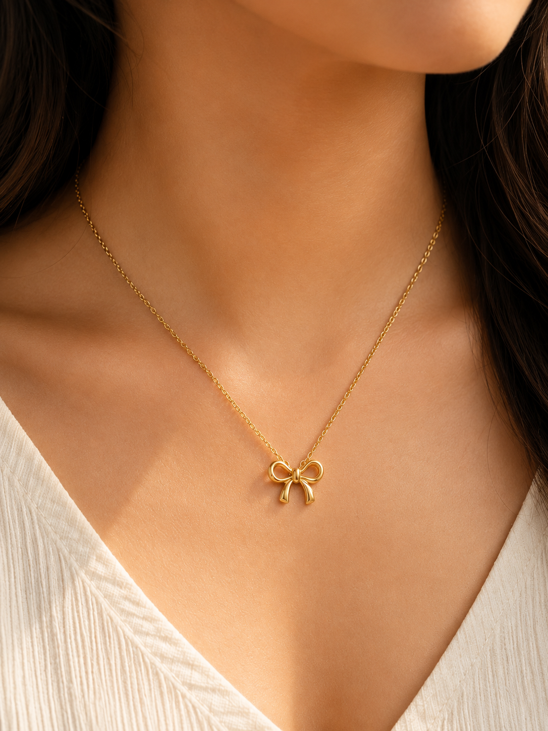 Elegant Gold Bow Pendant on Chain - Image 3